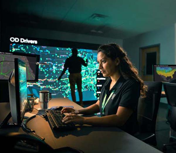 Female employee working in the Command Center