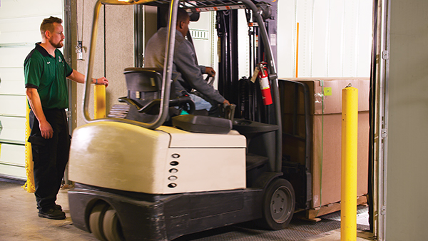 Loading freight onto dock trailer