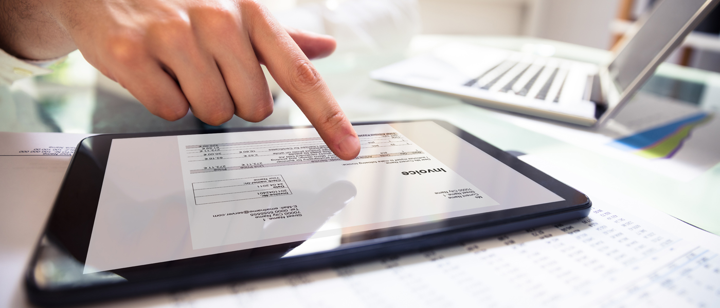 Customer viewing invoice on iPad.