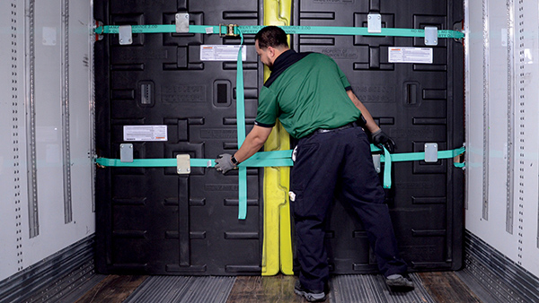 DRIVER_STRAPPING_SECURITY_DIVIDER_WIDE_OTS_INSIDE_TRAILER_600x338.jpg