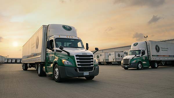 2 Tractor Trailers - Connected Angled at Dock, Dusk